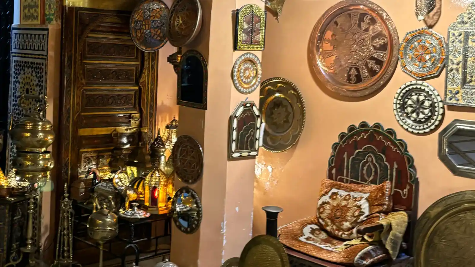 Fes souks shopping tour inside an artisan shop with traditional Moroccan crafts and souvenirs